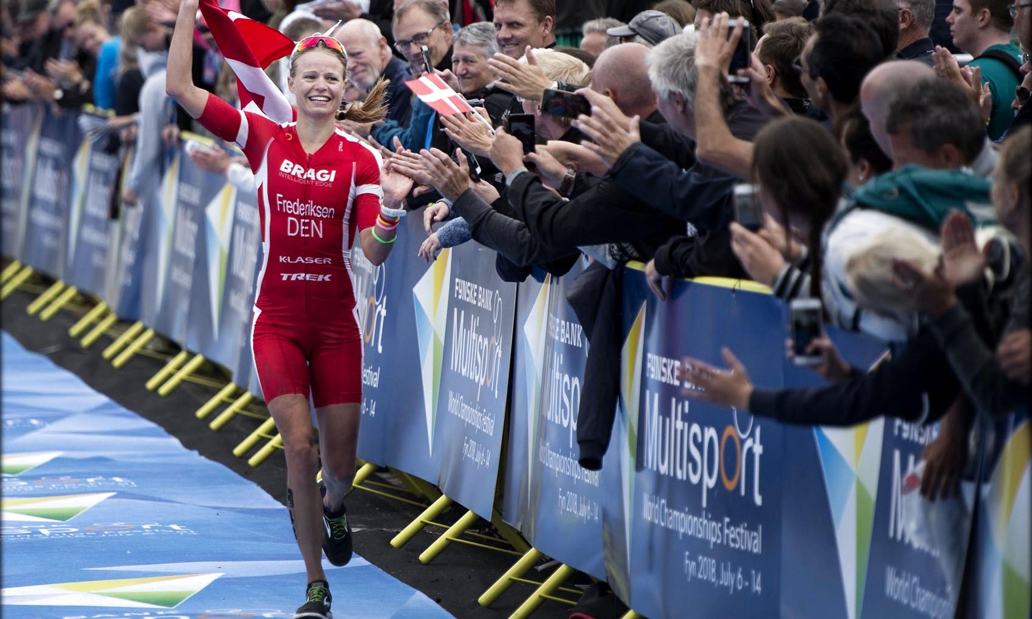 Sport Event Danmark regner med, at Fyn har tjent 30 mio. kr. i turismeomsætning under VM i Multisport. Her ses den danske triatlet Helle Frederiksen vinde VM i triathlon på den lange distance.